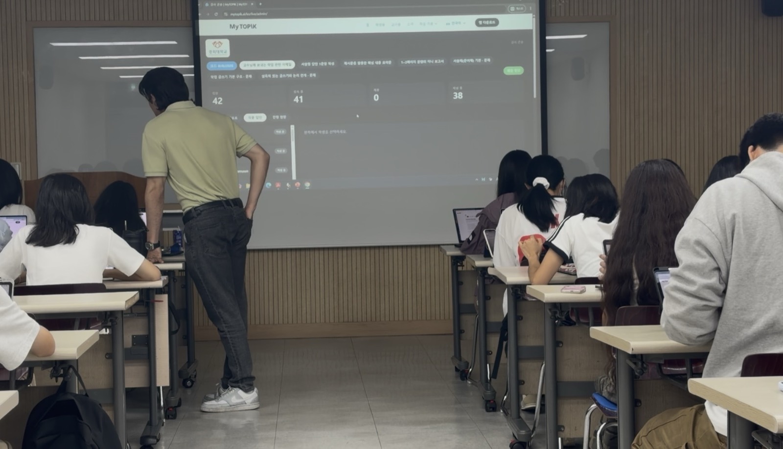 The lecturer console projected, showing who is in the room and who is still writing